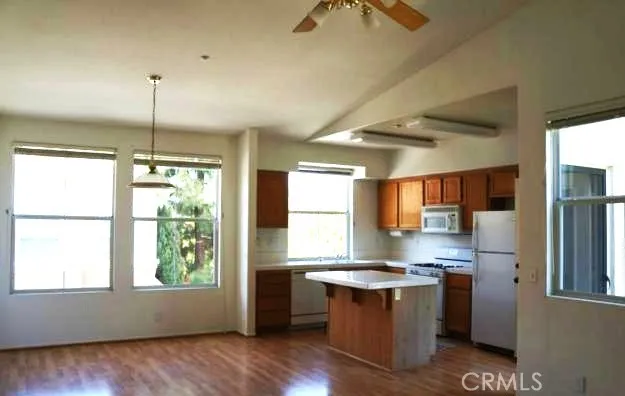 a kitchen with counter top space and sink