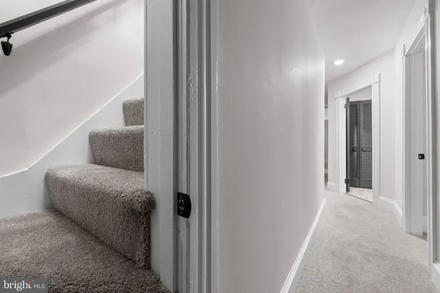 a view of a livingroom with a staircase