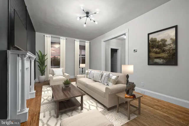 a living room with furniture a lamp and a window