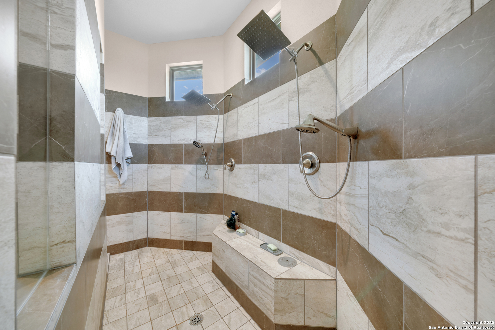 7151 Agarita Mist Fair Oaks Ranch, TX 78015 - Photo 23 of 49 a bathroom with a bathtub and shower