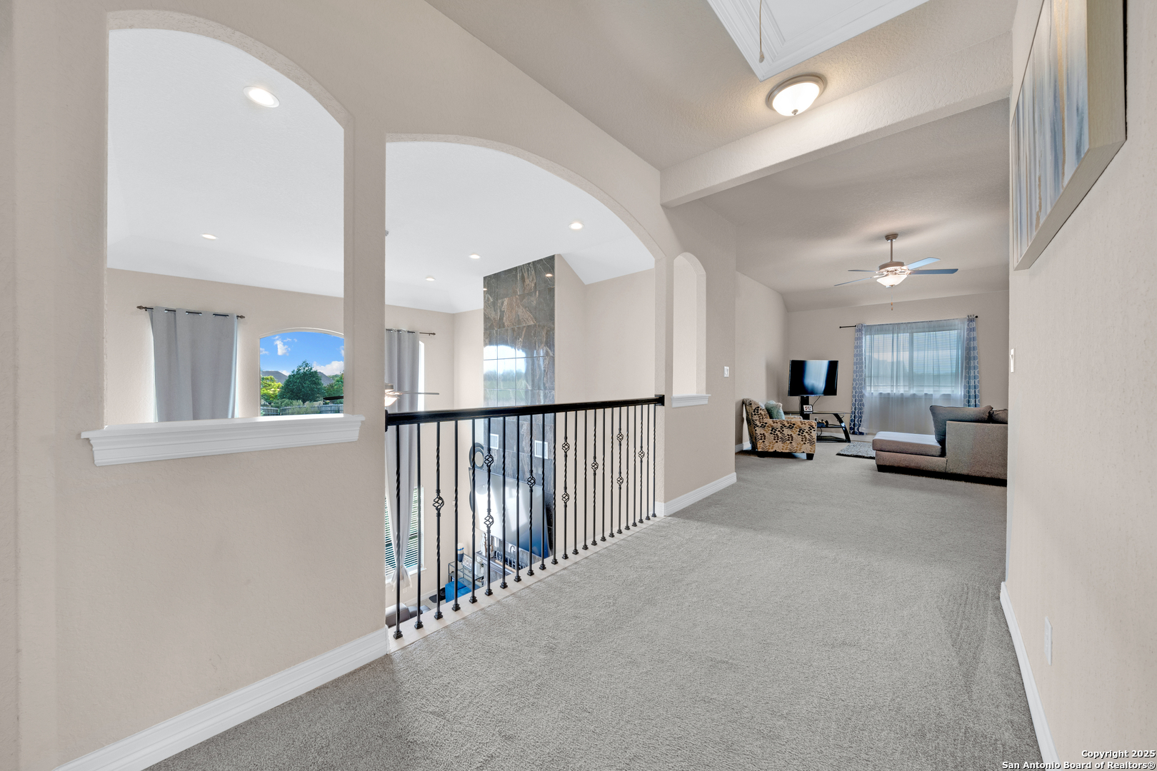 7151 Agarita Mist Fair Oaks Ranch, TX 78015 - Photo 26 of 49 a view of a livingroom with a staircase