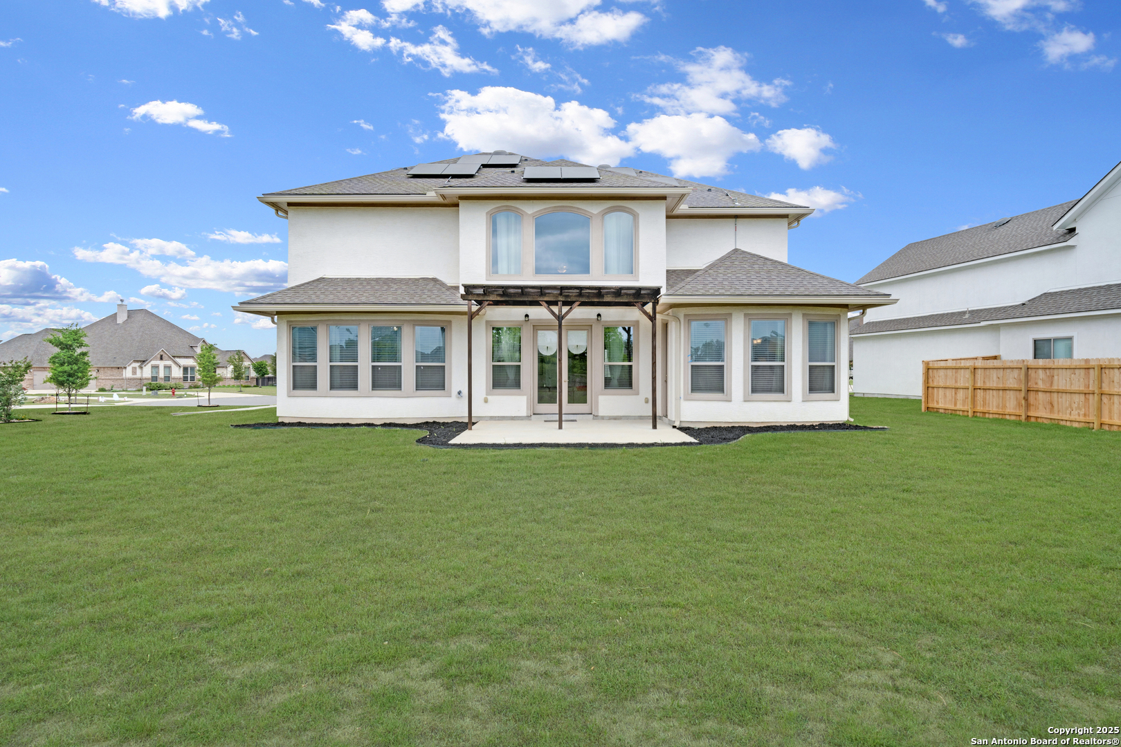 7151 Agarita Mist Fair Oaks Ranch, TX 78015 - Photo 36 of 49 a view of a house with a garden