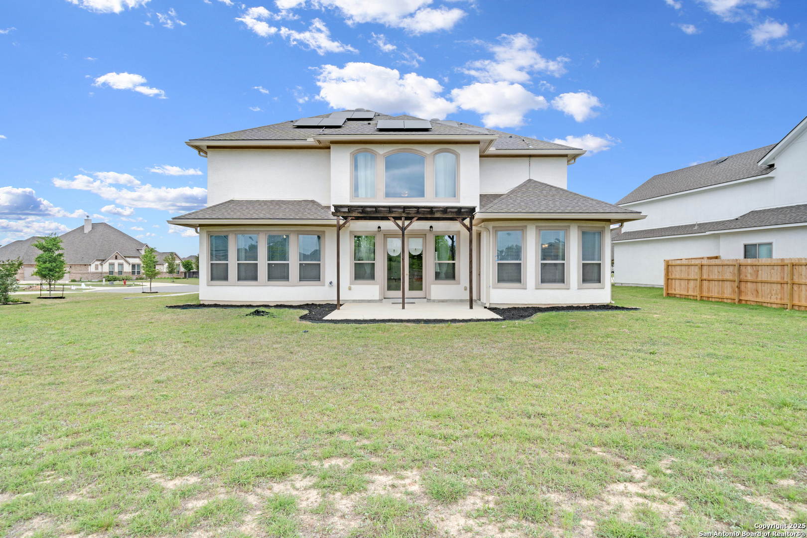 7151 Agarita Mist Fair Oaks Ranch, TX 78015 - Photo 41 of 49 a view of a house with a swimming pool