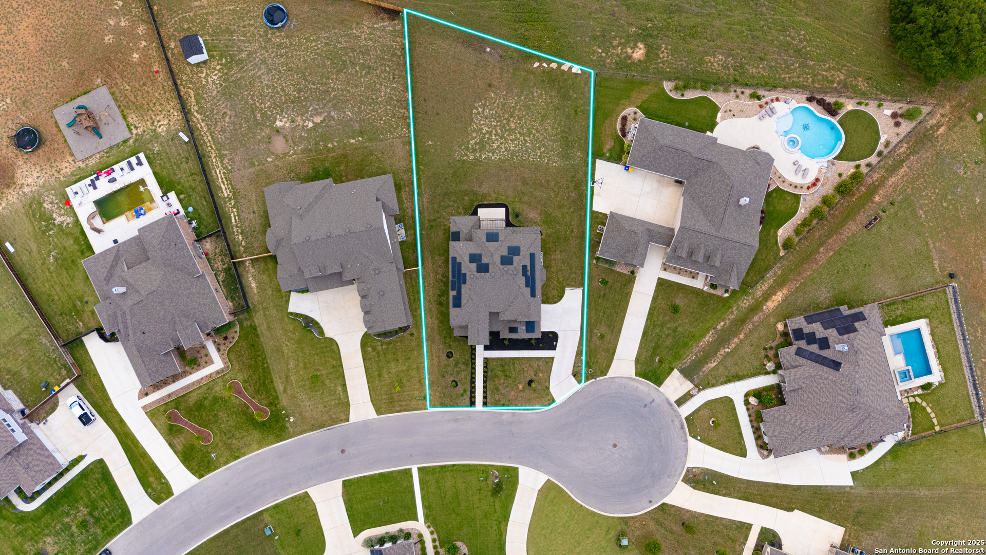 7151 Agarita Mist Fair Oaks Ranch, TX 78015 - Photo 45 of 49 an aerial view of a house with a swimming pool