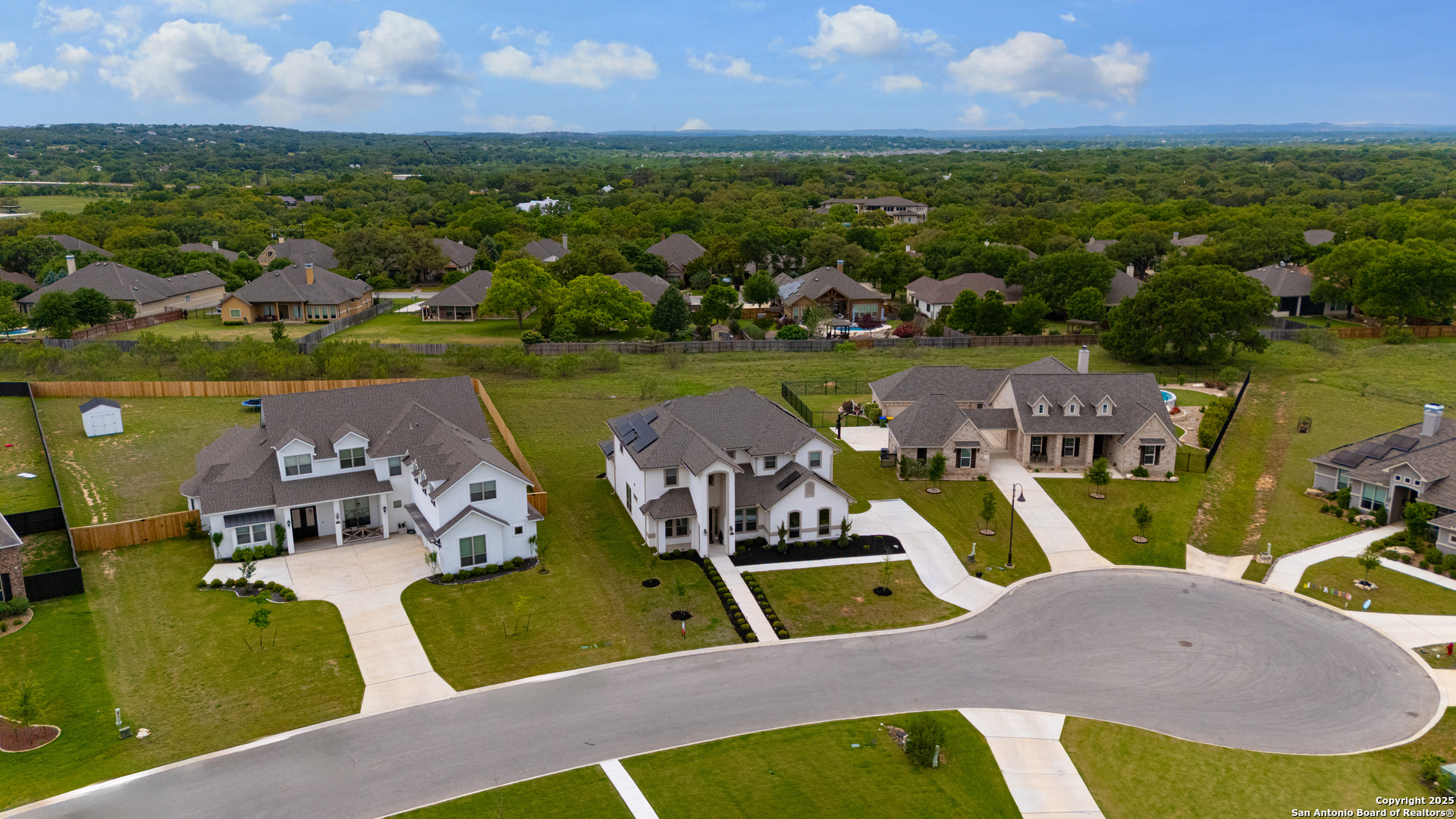 7151 Agarita Mist Fair Oaks Ranch, TX 78015 - Photo 49 of 49 an aerial view of a house with outdoor space pool lake and outdoor seating