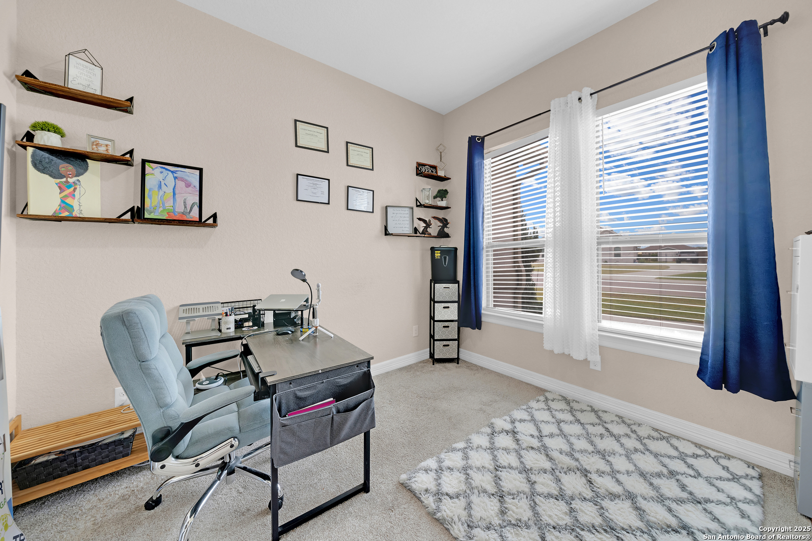 7151 Agarita Mist Fair Oaks Ranch, TX 78015 - Photo 5 of 49 a bedroom with furniture and a window