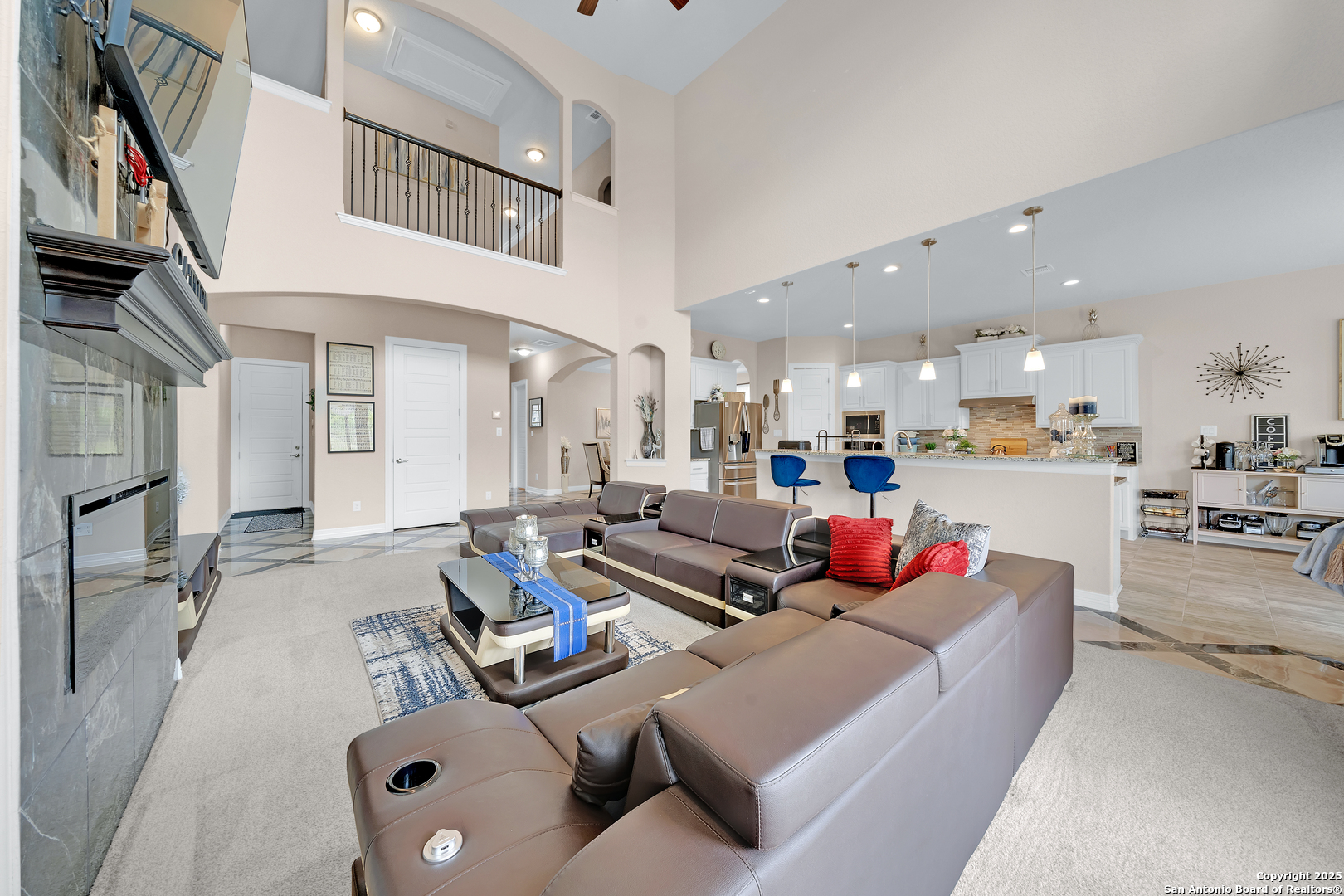 7151 Agarita Mist Fair Oaks Ranch, TX 78015 - Photo 9 of 49 a living room with furniture kitchen view and a couch