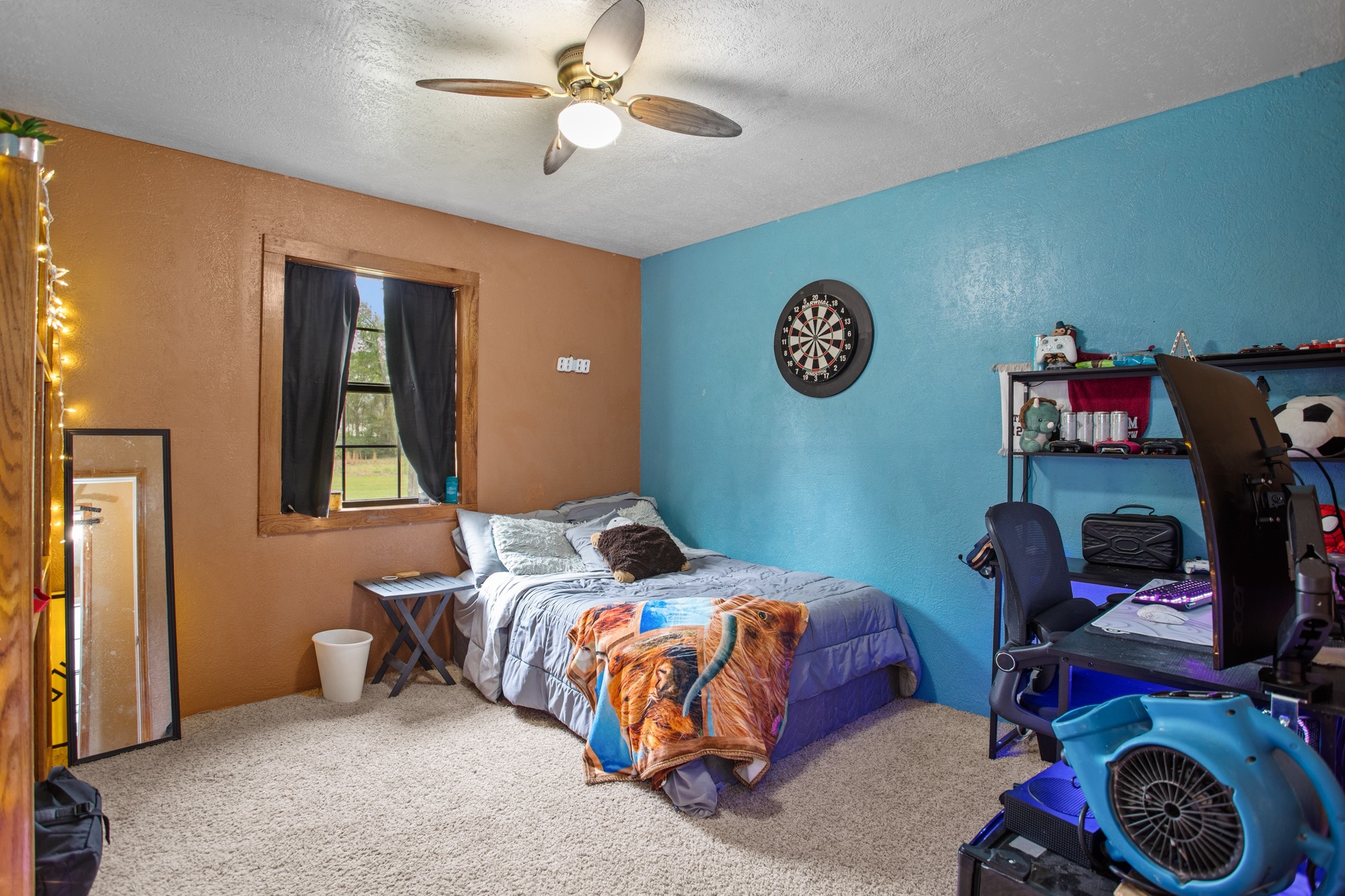 991 Herman Nerren Road Huntington, TX 75949 - Photo 12 of 23 a bedroom with a bed and a window
