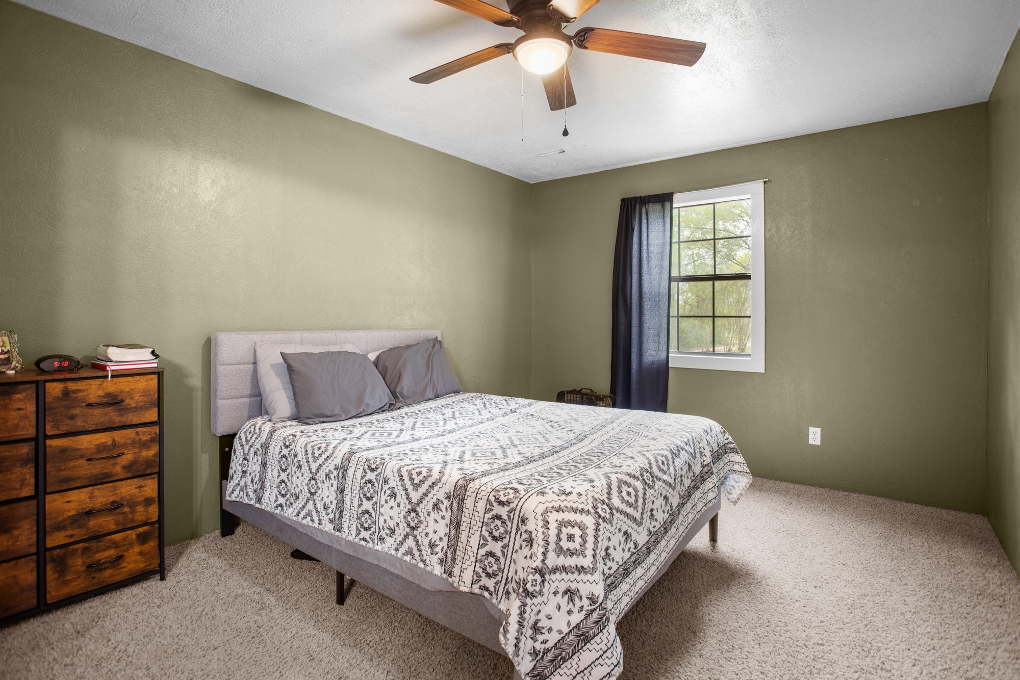 991 Herman Nerren Road Huntington, TX 75949 - Photo 15 of 23 a bedroom with a bed and a window