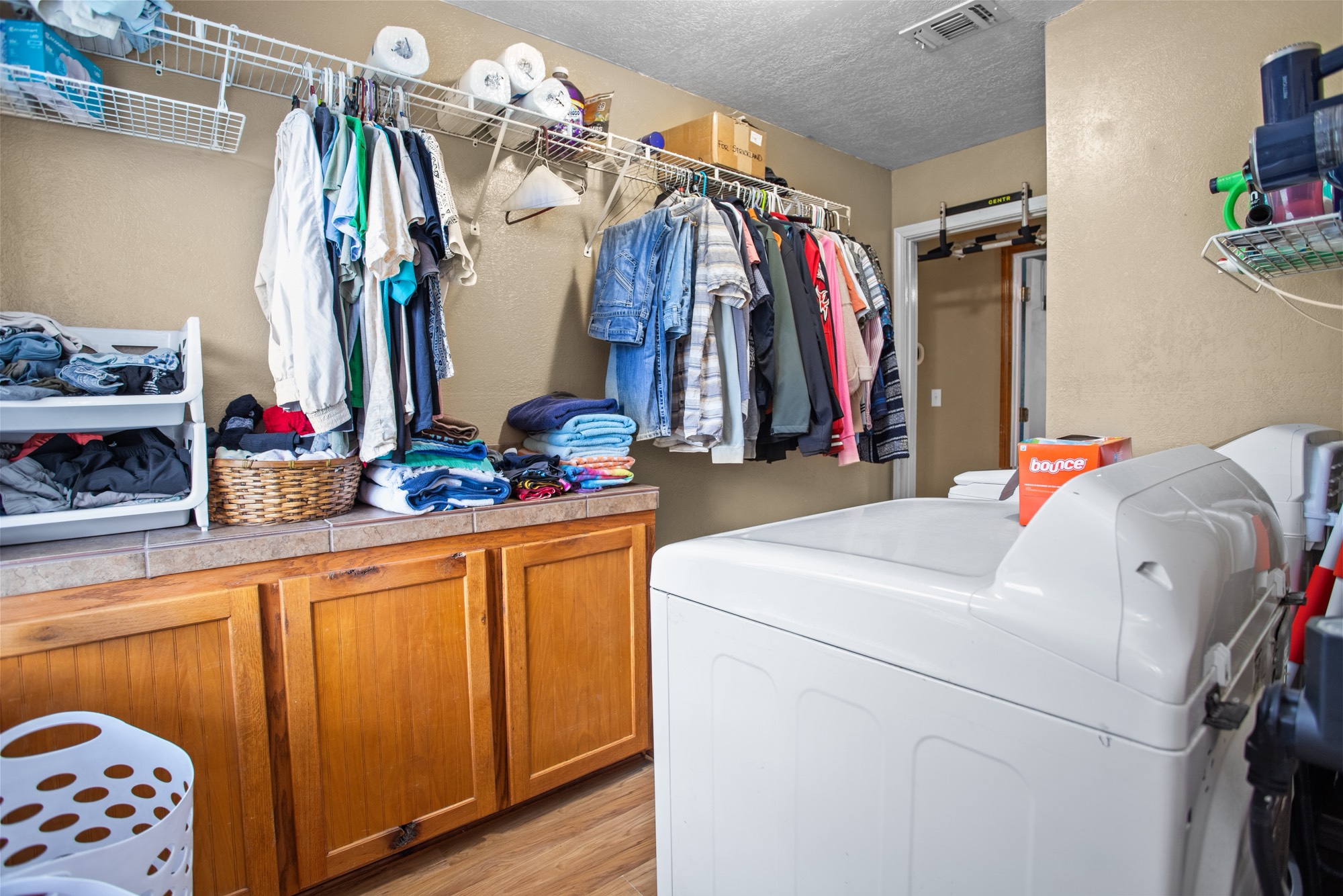 991 Herman Nerren Road Huntington, TX 75949 - Photo 18 of 23 a view of walk in closet with clothes and shoes