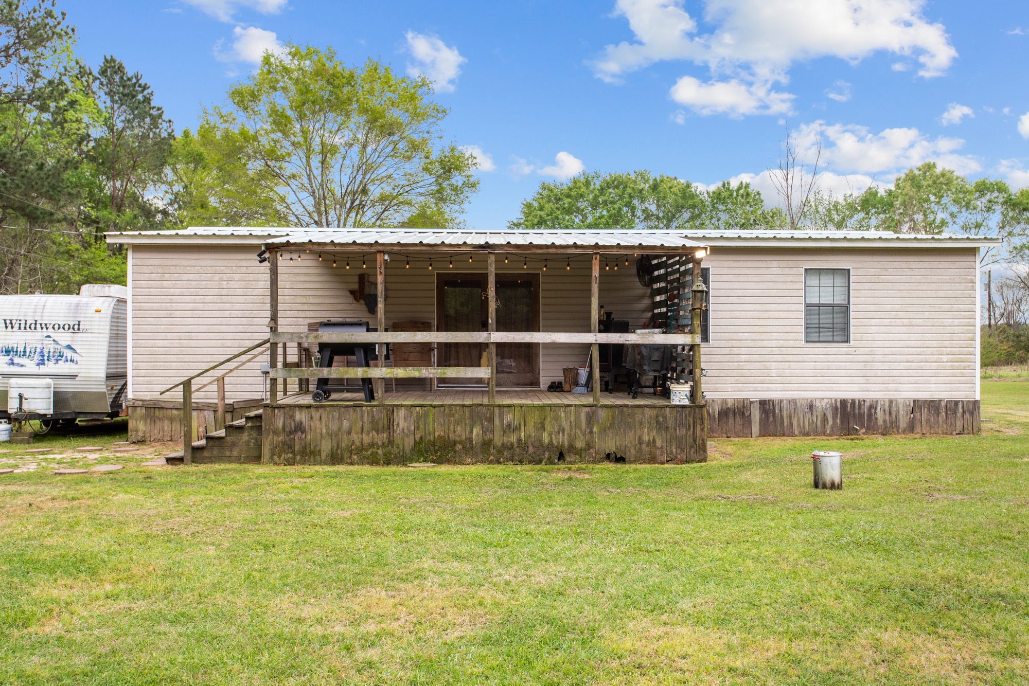 991 Herman Nerren Road Huntington, TX 75949 - Photo 22 of 23 a view of a house with a backyard