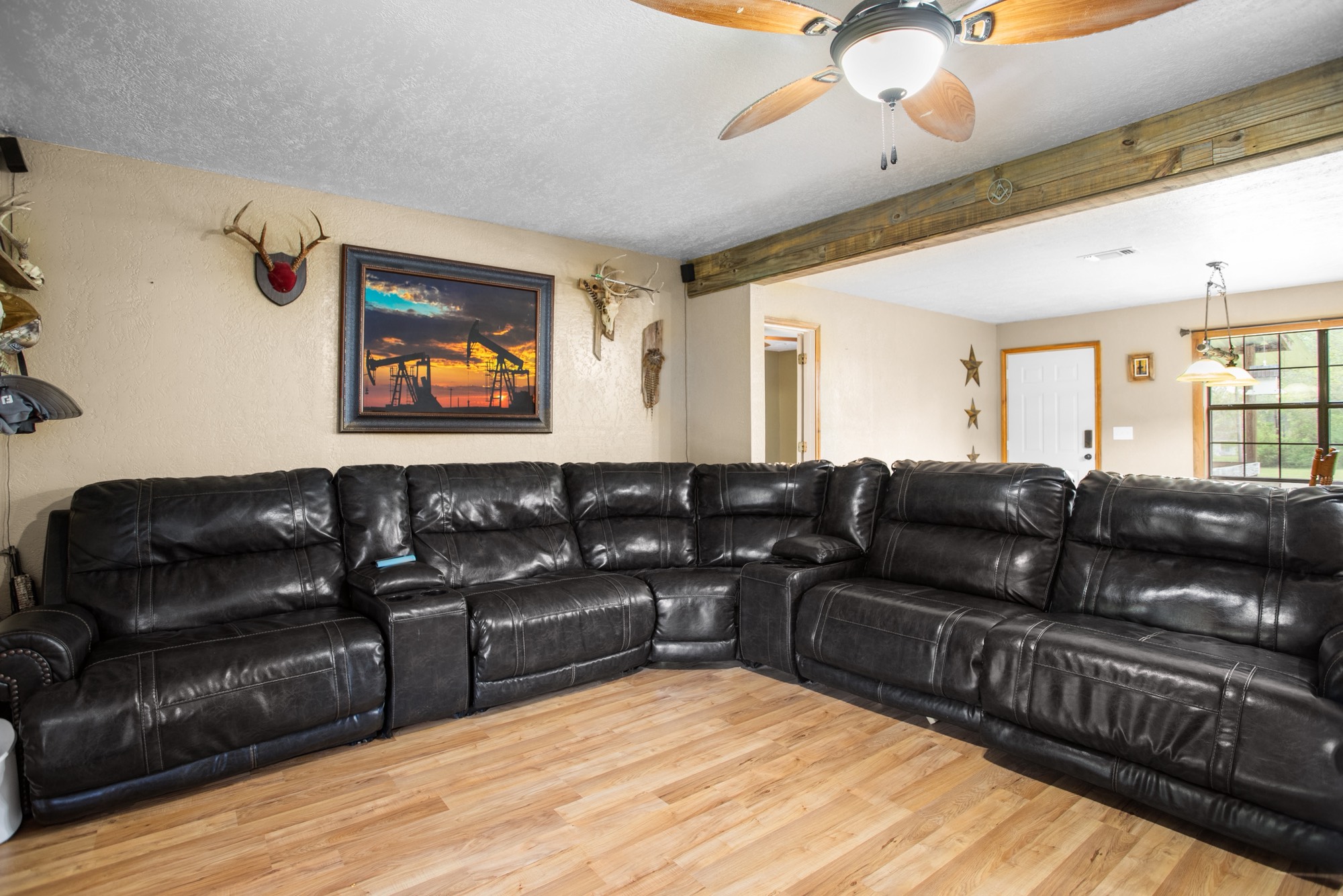 991 Herman Nerren Road Huntington, TX 75949 - Photo 3 of 23 a living room with furniture and a flat screen tv