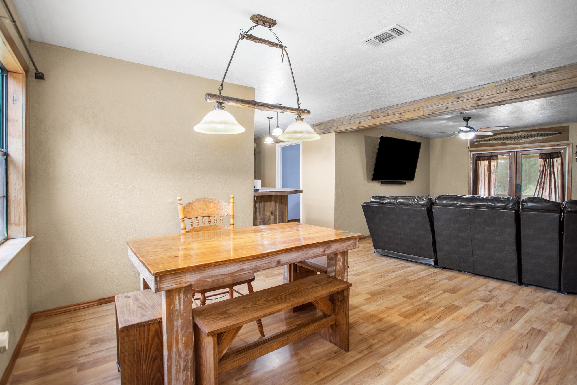 991 Herman Nerren Road Huntington, TX 75949 - Photo 7 of 23 a view of a workspace with furniture and wooden floor