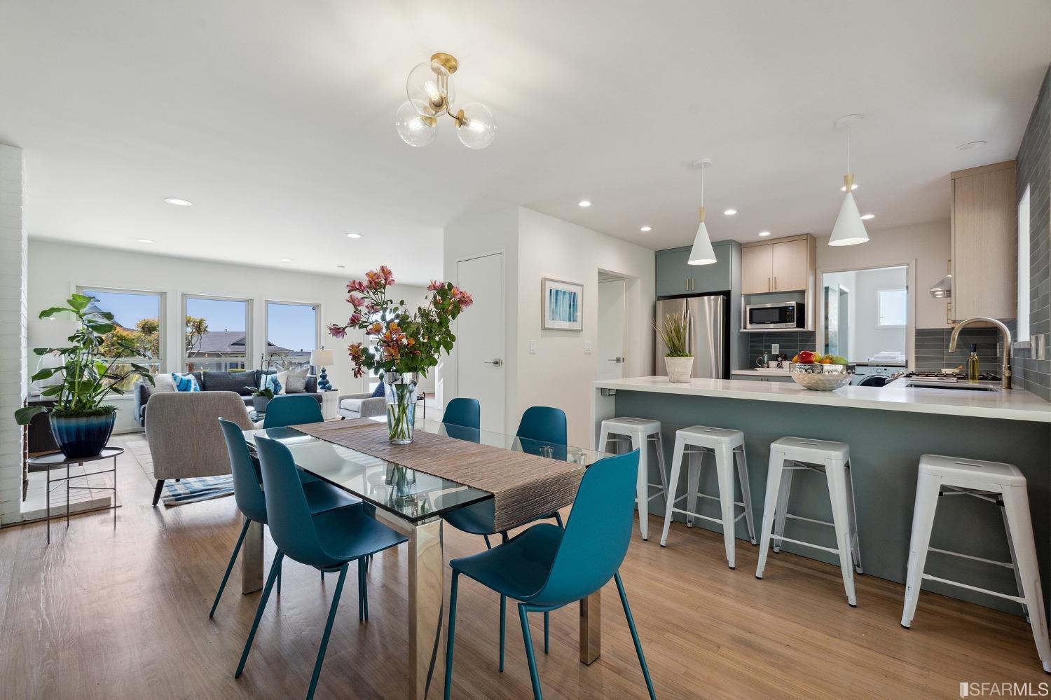 39 Idlewild Court Pacifica, CA 94044 - Photo 14 of 79 a view of a dining room with furniture and wooden floor