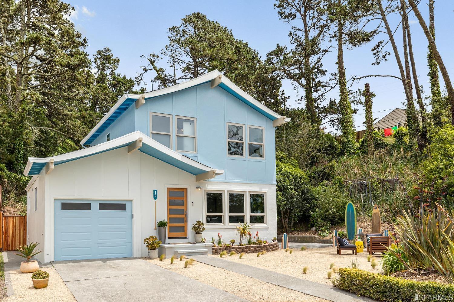 39 Idlewild Court Pacifica, CA 94044 - Photo 2 of 79 a front view of a house with garden