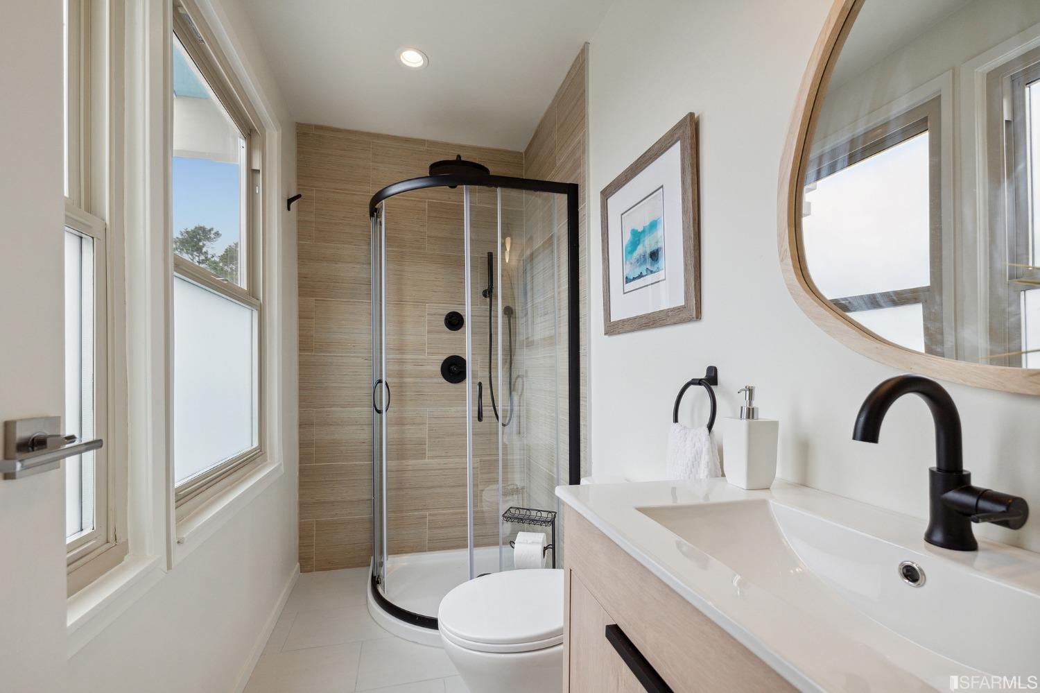 39 Idlewild Court Pacifica, CA 94044 - Photo 30 of 79 a bathroom with a sink and a mirror