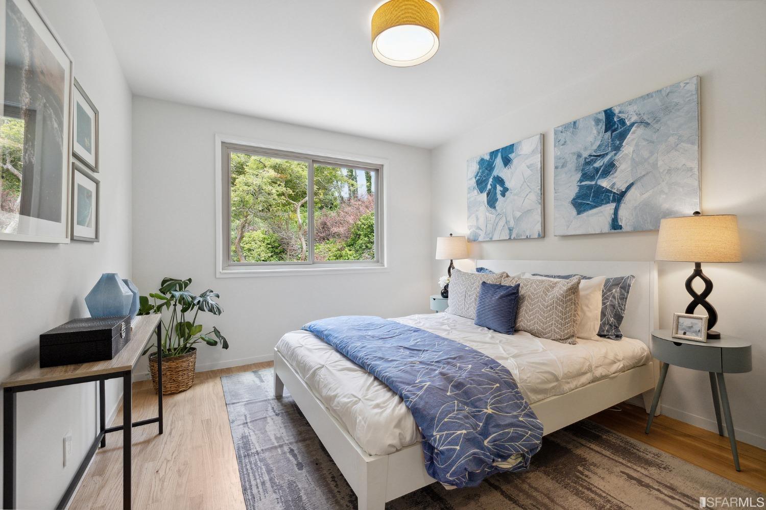 39 Idlewild Court Pacifica, CA 94044 - Photo 32 of 79 a bedroom with a bed and a potted plant