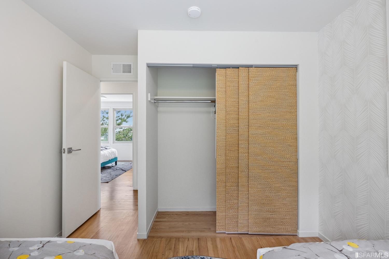 39 Idlewild Court Pacifica, CA 94044 - Photo 36 of 79 a view of a hallway with wooden floor and closet