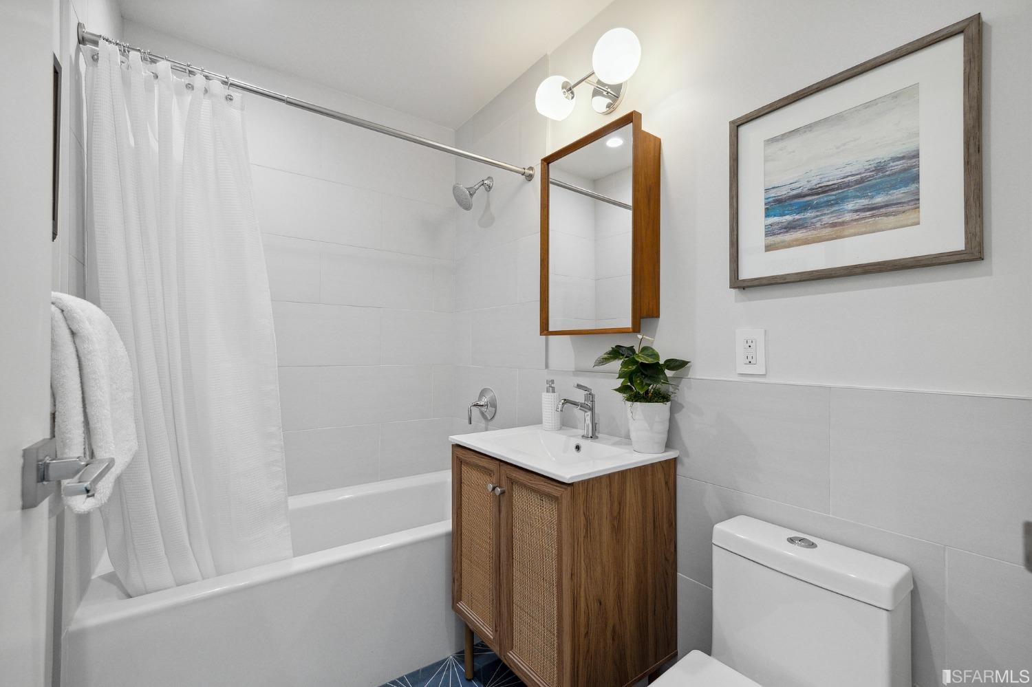 39 Idlewild Court Pacifica, CA 94044 - Photo 38 of 79 a bathroom with a sink a toilet and shower