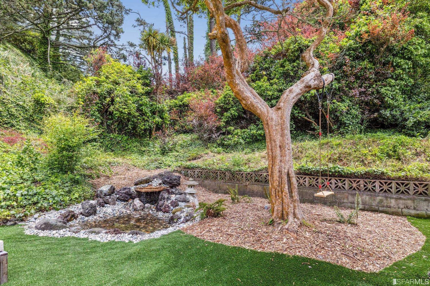 39 Idlewild Court Pacifica, CA 94044 - Photo 51 of 79 a view of a yard with a tree