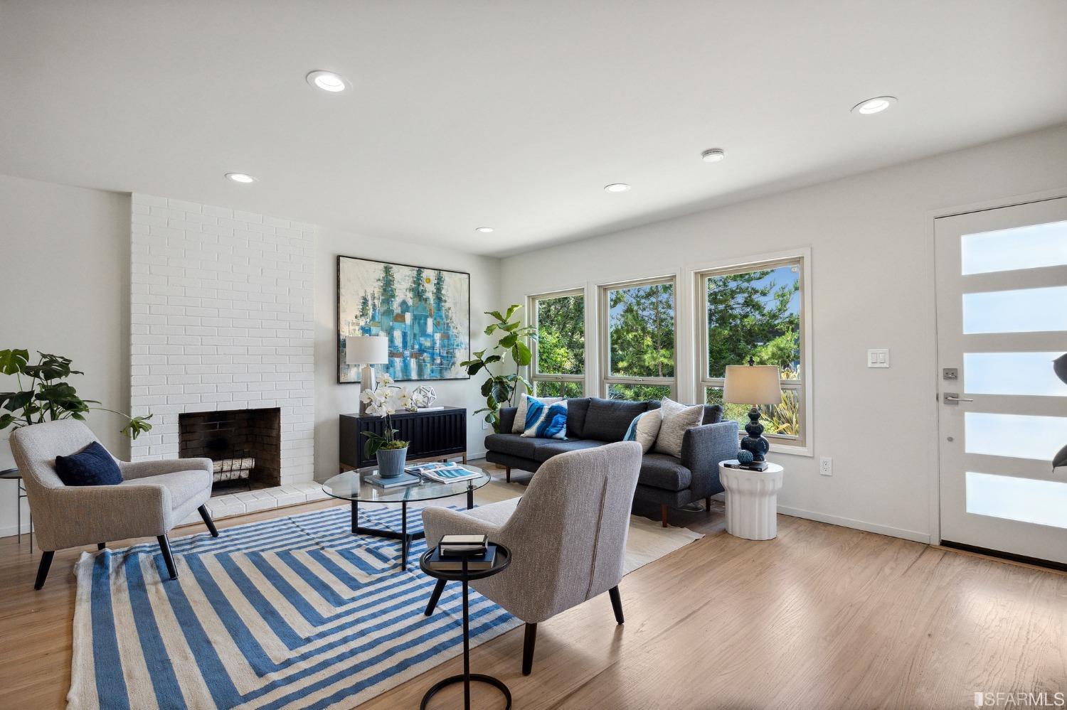 39 Idlewild Court Pacifica, CA 94044 - Photo 6 of 79 a living room with furniture and a fireplace