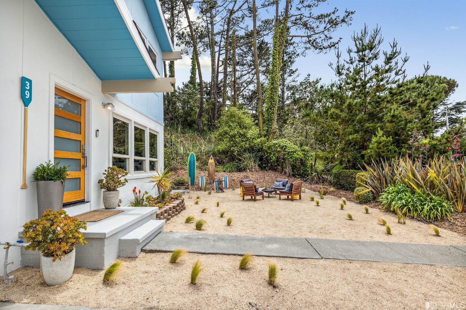 39 Idlewild Court Pacifica, CA 94044 - Photo 61 of 79 a view of a patio with couches table and chairs and potted plants