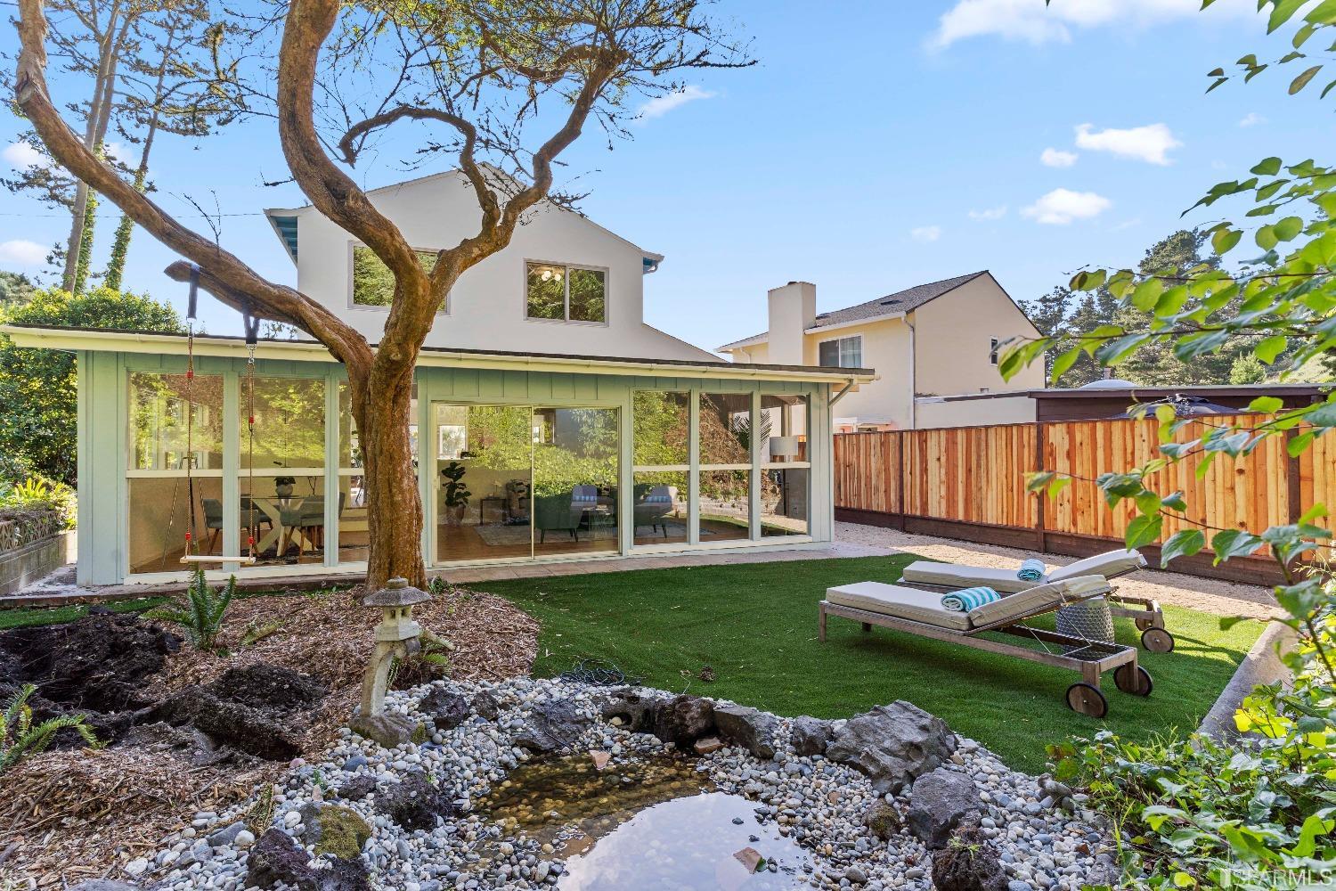 39 Idlewild Court Pacifica, CA 94044 - Photo 72 of 79 a view of a house with backyard and sitting area