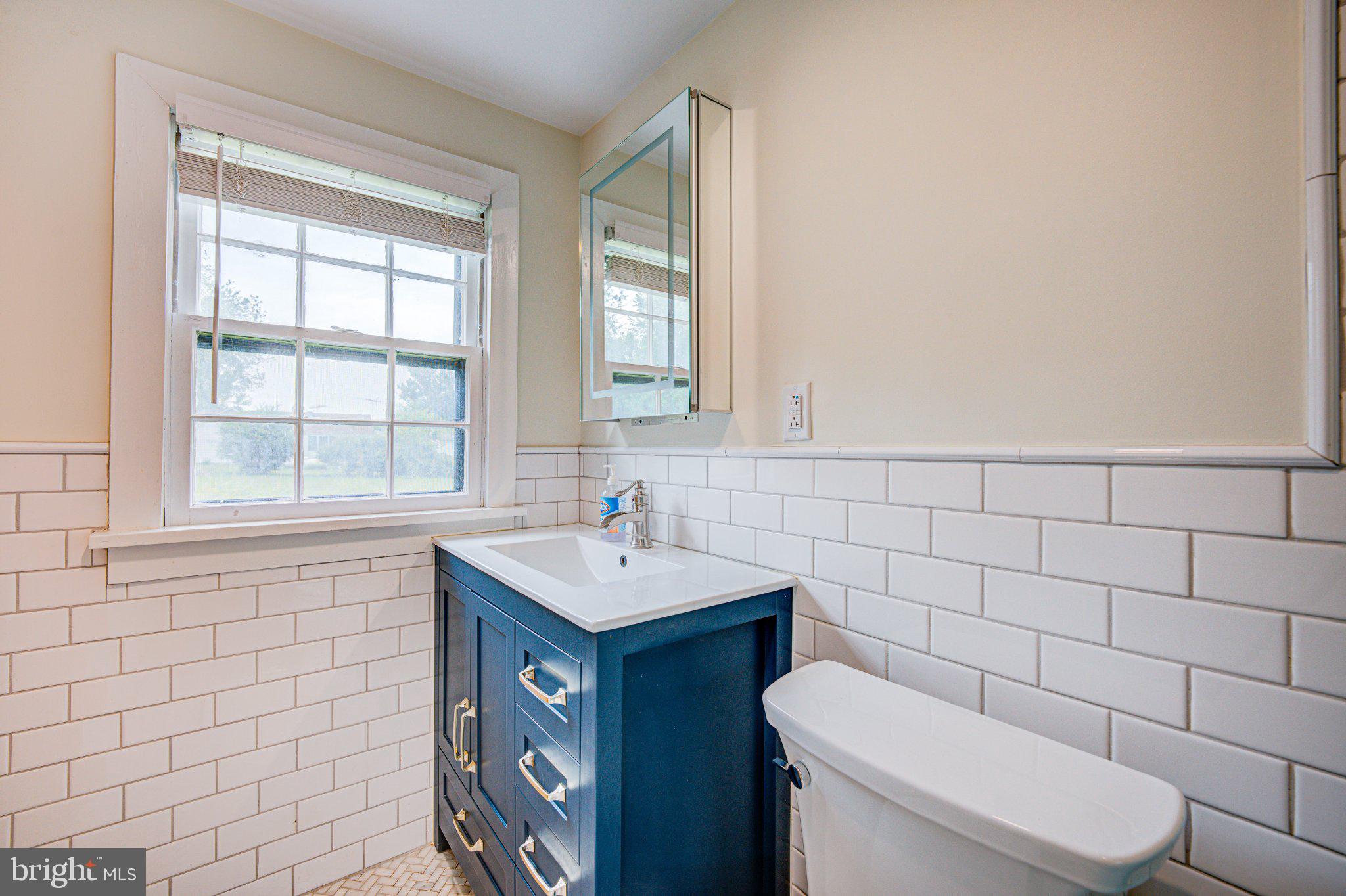 24177 Rapidan Road Mitchells, VA 22729 - Photo 17 of 43 Charming bathroom with modern touches.
