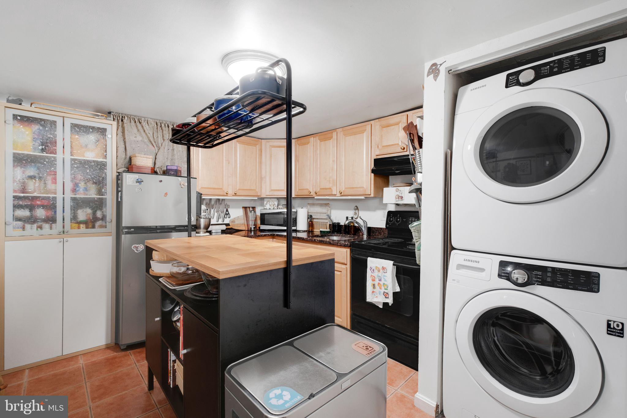 1209 6th Street Northeast, Unit B Washington, DC 20002 - Photo 3 of 23 Lower Level Kitchen w/ Washer & Dryer