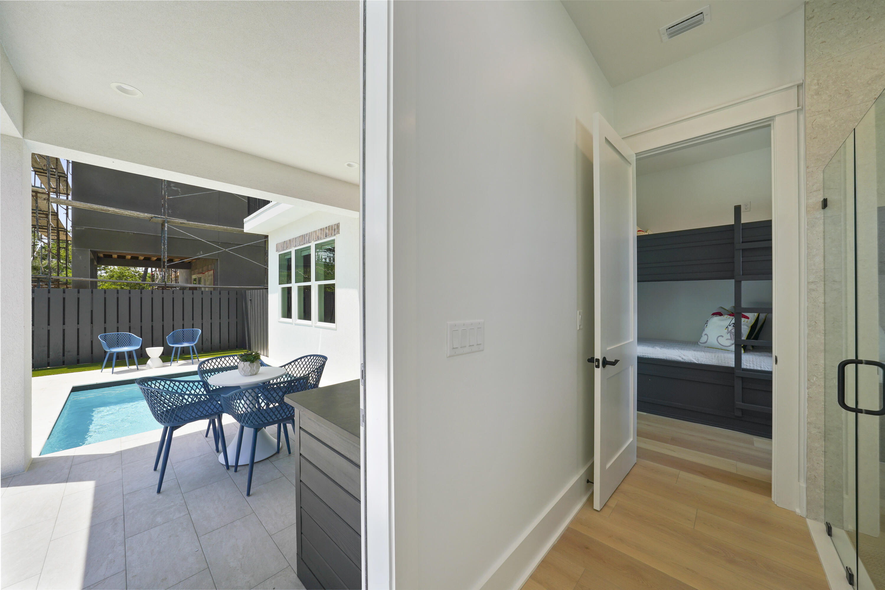 50 Sea Croft Cove Santa Rosa Beach, FL 32459 - Photo 16 of 46 a view of a room that has a bed and a table in it