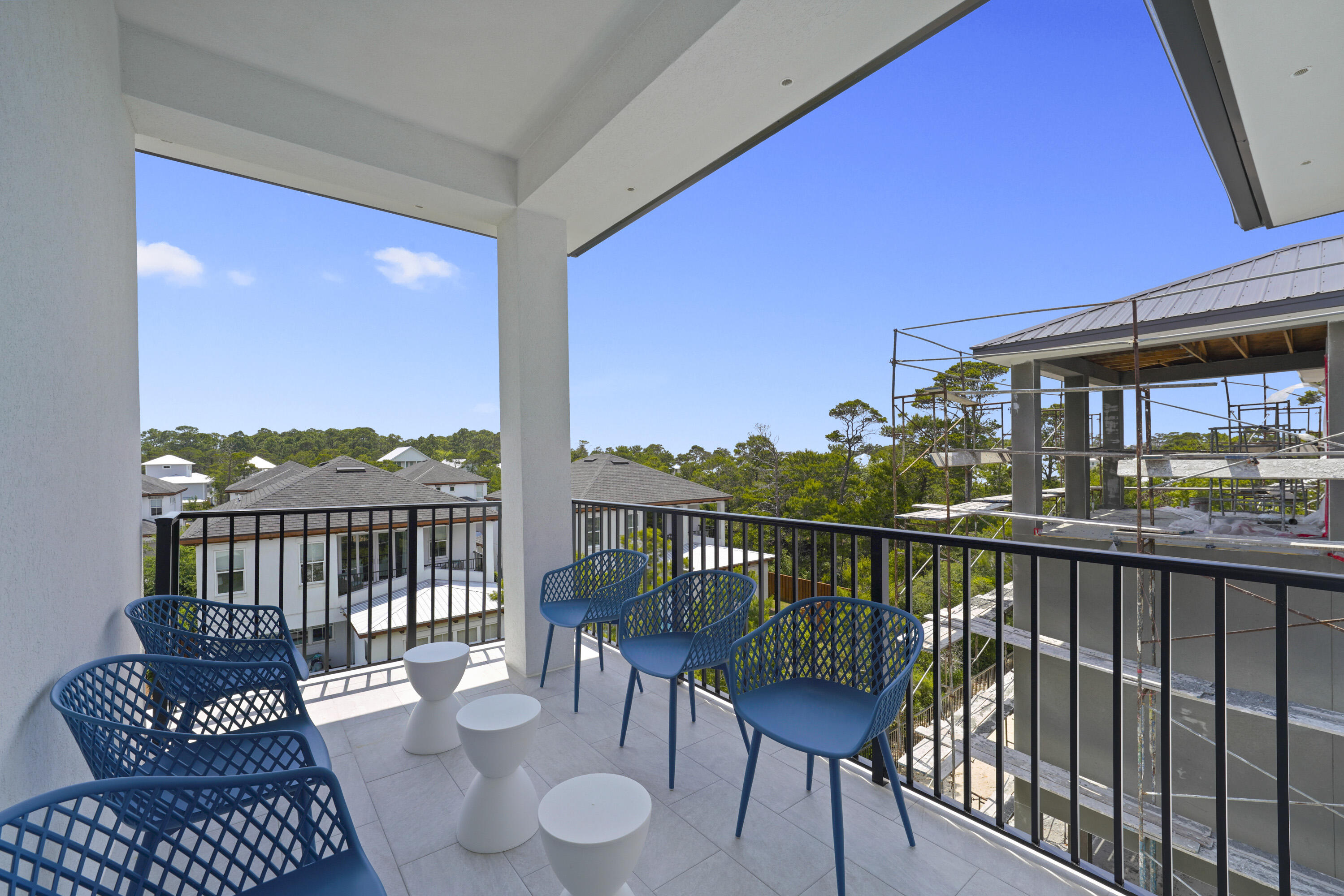 50 Sea Croft Cove Santa Rosa Beach, FL 32459 - Photo 34 of 46 a view of a balcony with chair and wooden floor