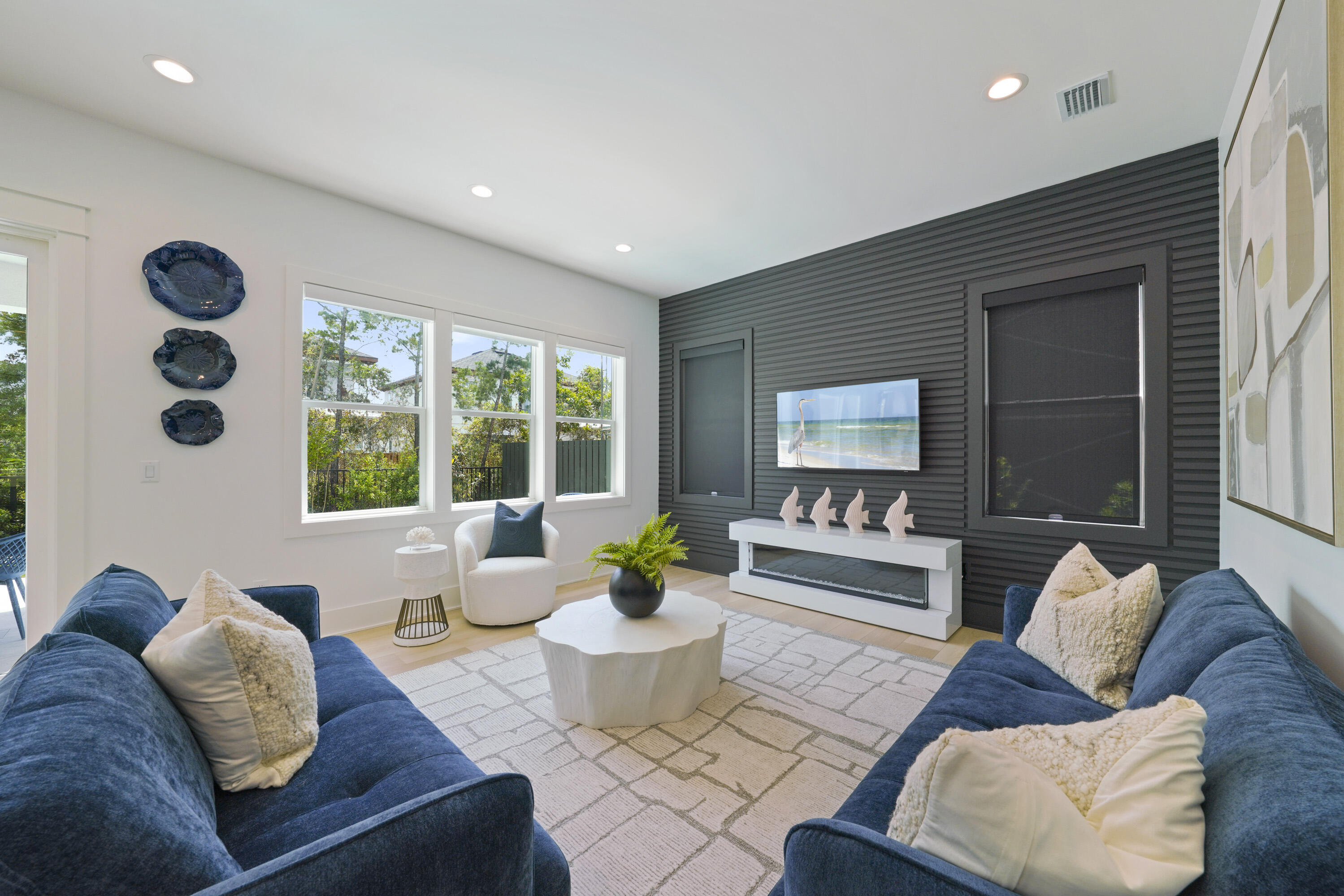 50 Sea Croft Cove Santa Rosa Beach, FL 32459 - Photo 5 of 46 a living room with furniture and a large window