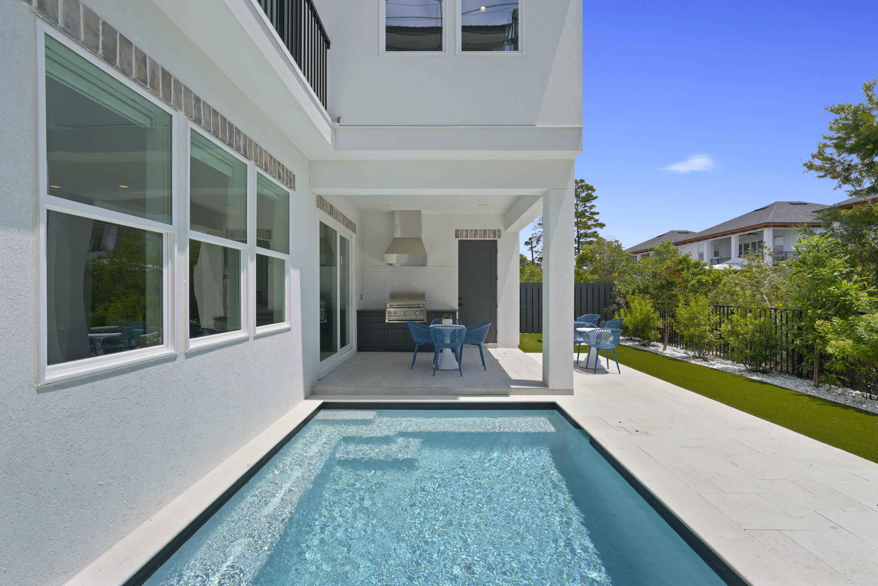 50 Sea Croft Cove Santa Rosa Beach, FL 32459 - Photo 8 of 46 a view of an house with backyard porch and furniture