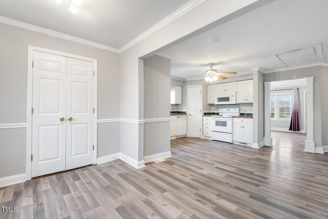 2034 Mt Harmony Church Road Rougemont, NC 27572 - Photo 15 of 40 a view of kitchen view wooden floor and window
