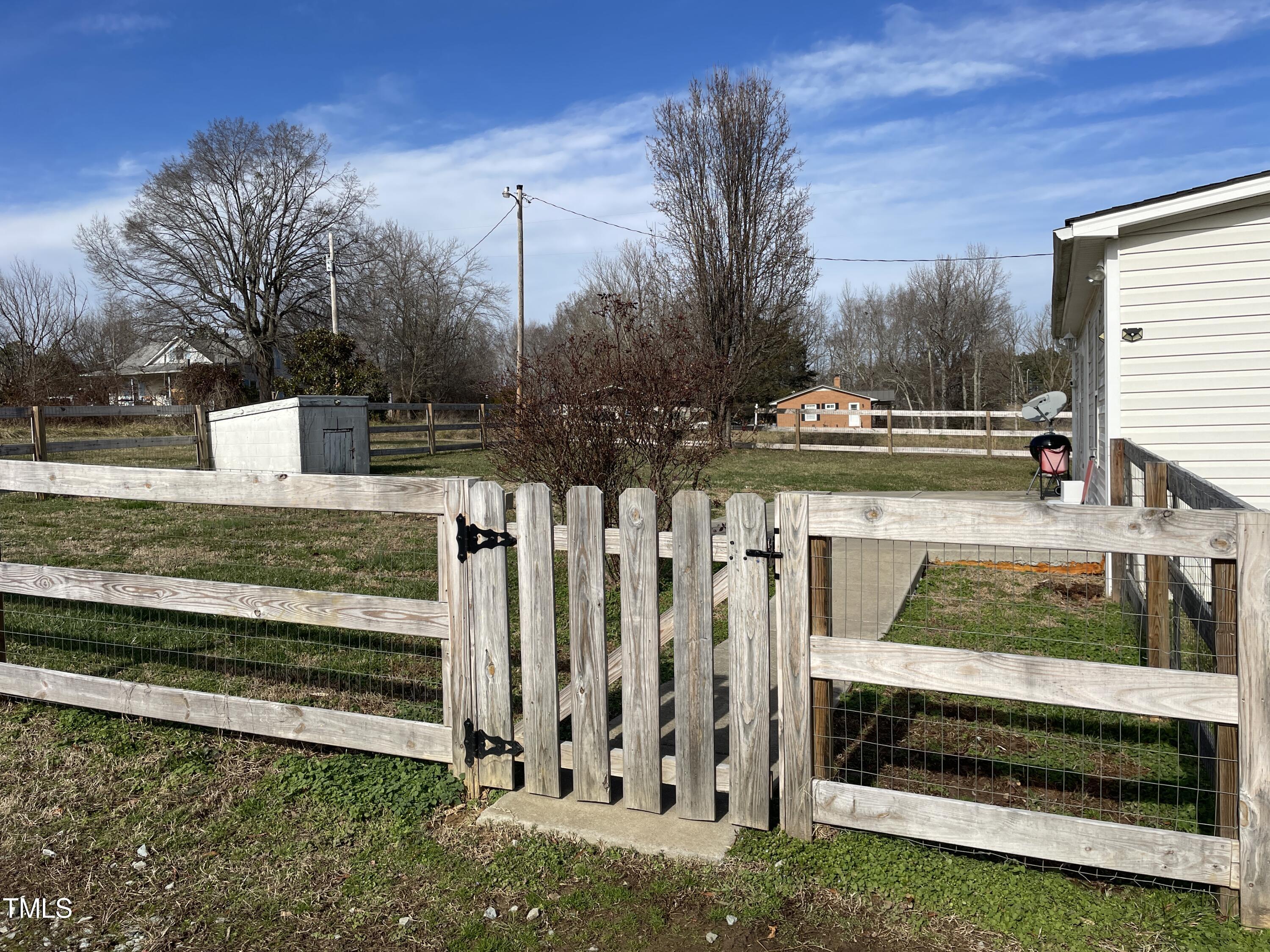 2034 Mt Harmony Church Road Rougemont, NC 27572 - Photo 26 of 40 a view of backyard with wooden fence
