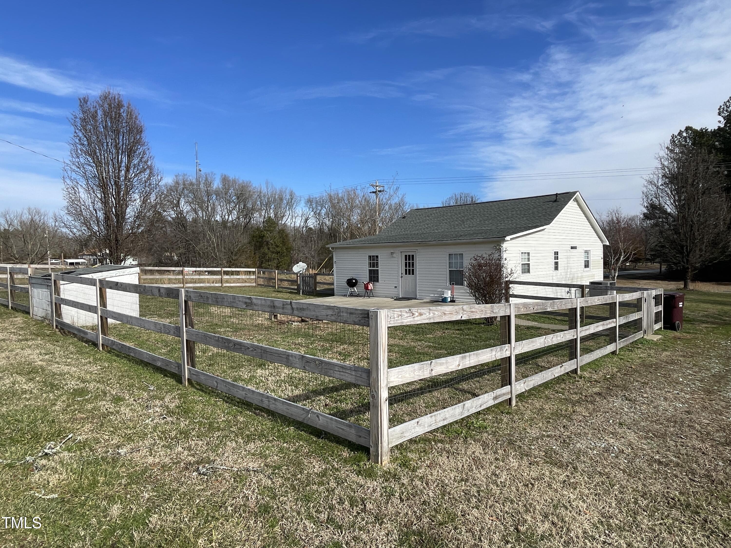 2034 Mt Harmony Church Road Rougemont, NC 27572 - Photo 28 of 40 a view of a backyard with wooden fence