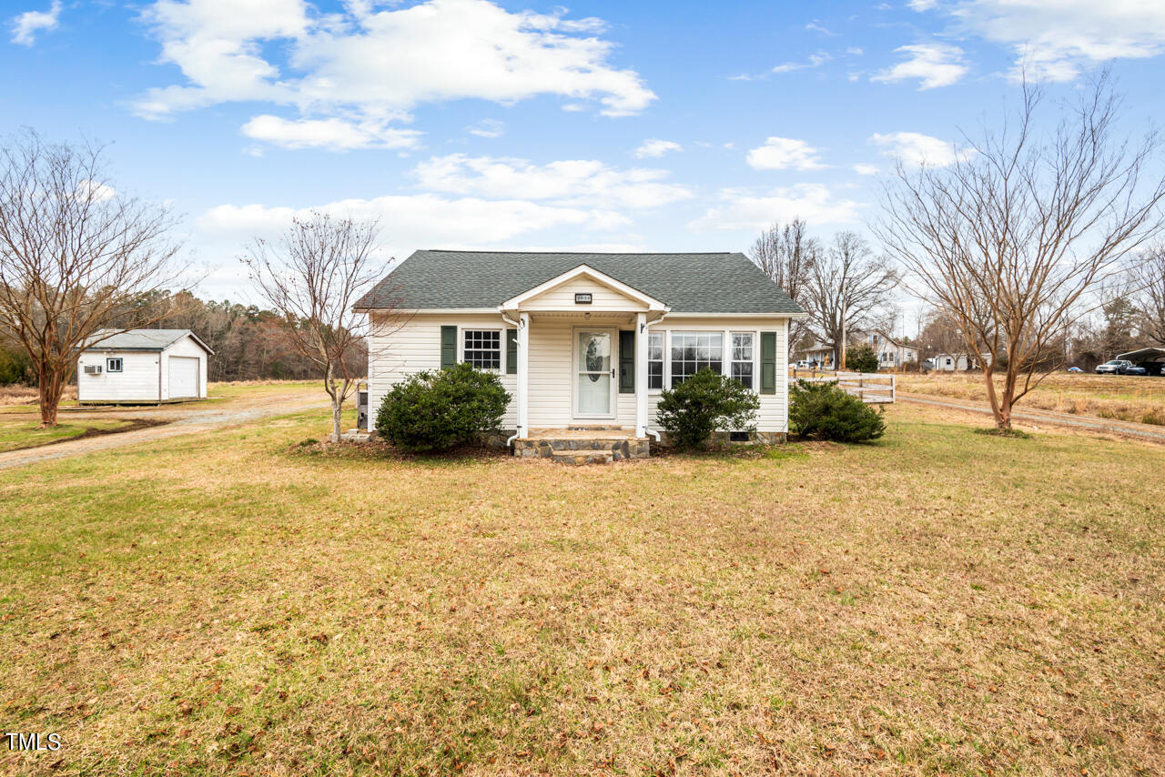 2034 Mt Harmony Church Road Rougemont, NC 27572 - Photo 36 of 40 a front view of a house with a yard