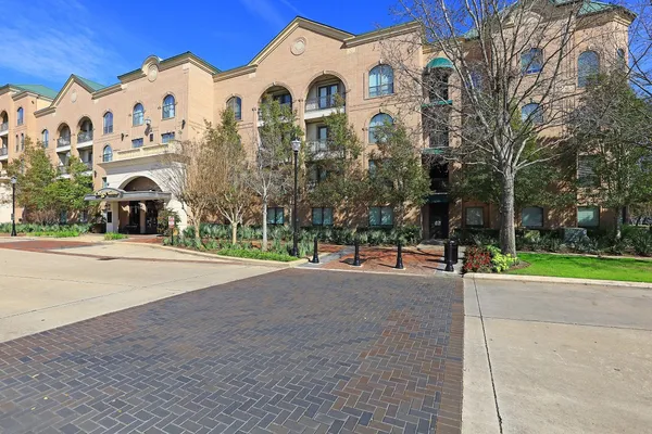 a view of a building with a road