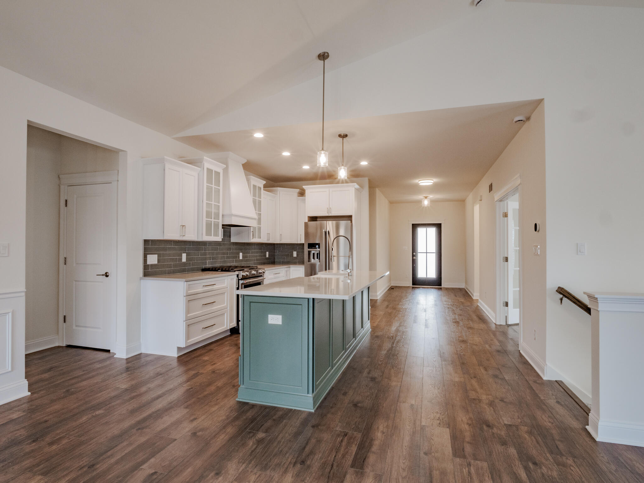 7522 East 116th Avenue Crown Point, IN 46307 - Photo 14 of 23 a kitchen with stainless steel appliances granite countertop wooden floors sink and cabinets