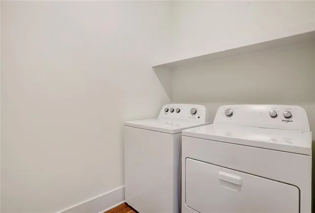 a utility room with dryer and washer