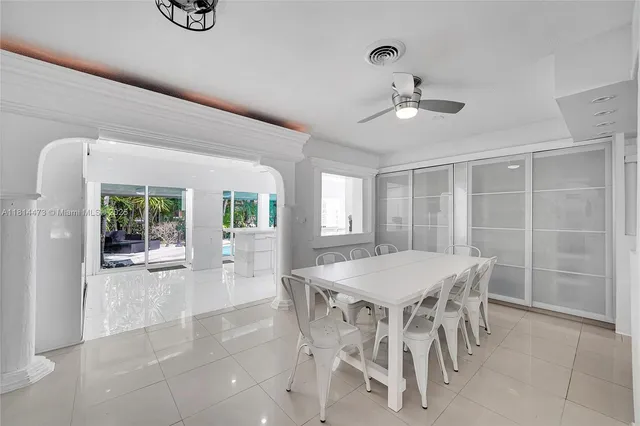 a kitchen with a sink and large window