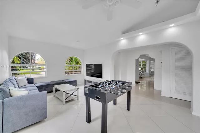 a view of a backyard with sitting area