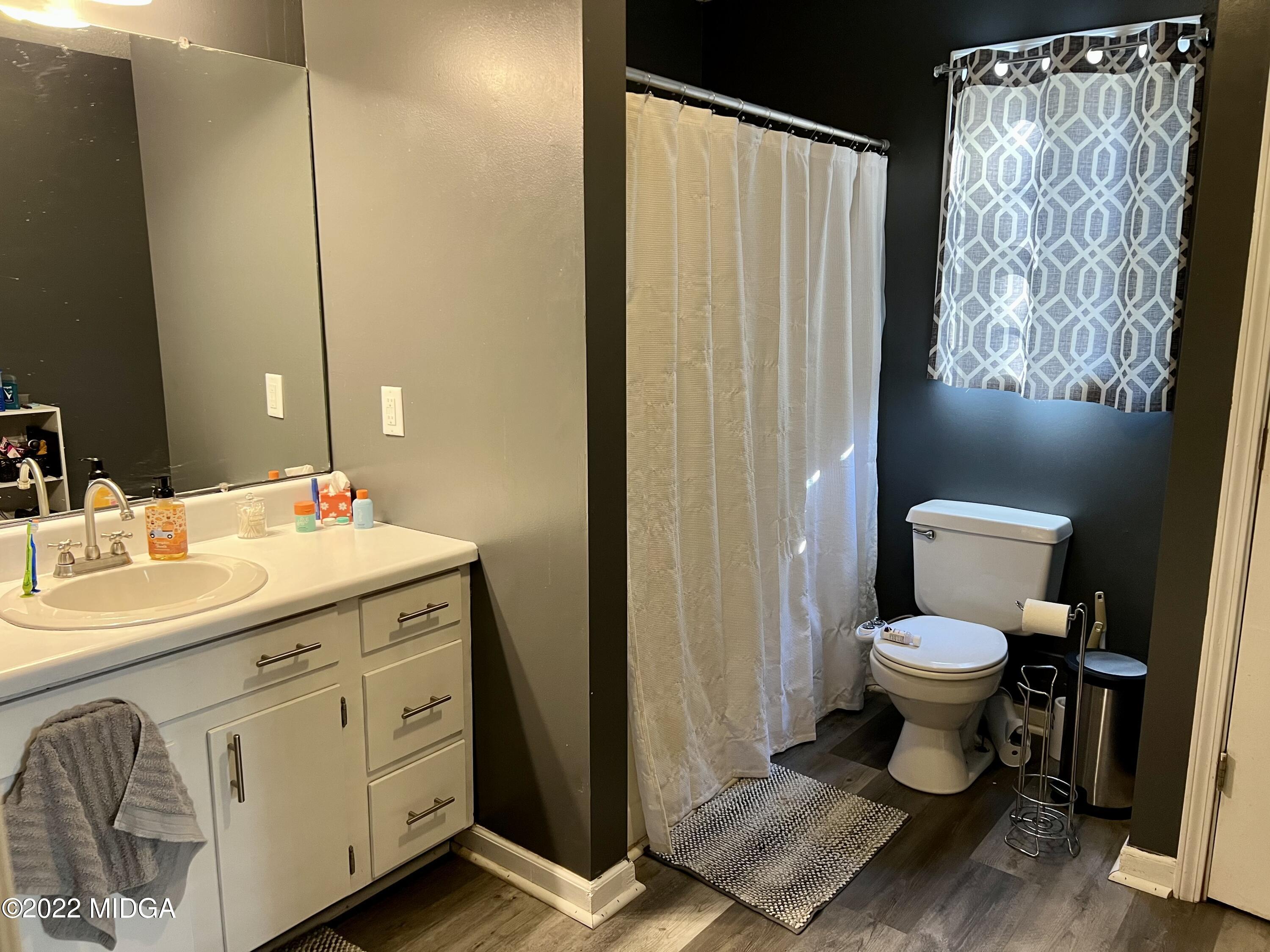 1817 Union Church Road Fort Valley, GA 31030 - Photo 6 of 18 a bathroom with a sink toilet and shower
