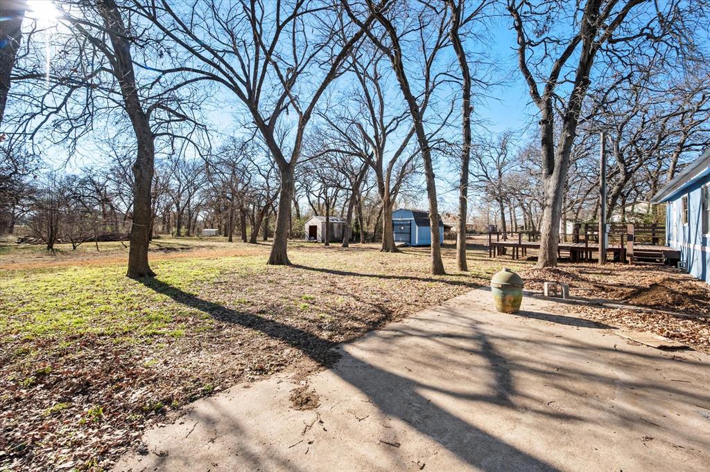 7634 Gibson Cemetery Road Mansfield, TX 76063 - Photo 11 of 11 a view of road with trees