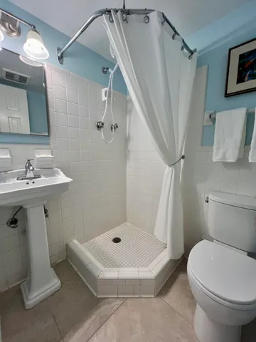 a view of outdoor space with swimming pool and lounge chair