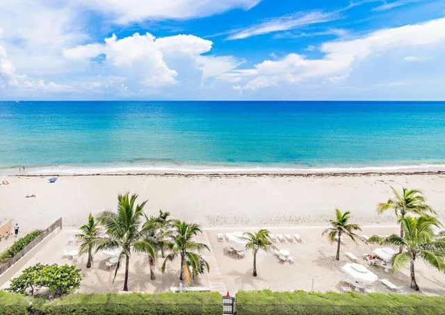 a front view of a building with garden