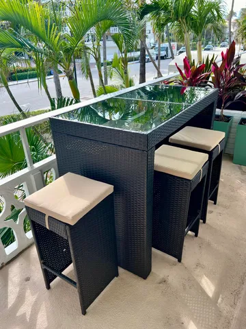 a view of a balcony with an outdoor space