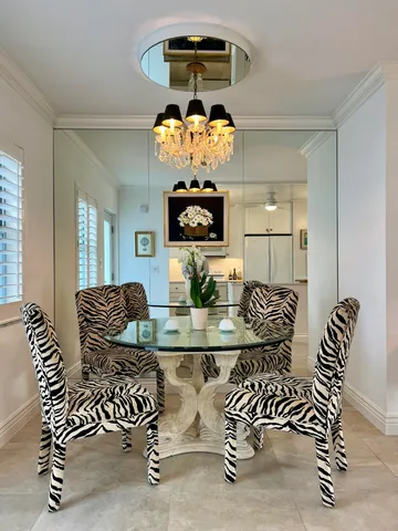a view of a kitchen center island and living room