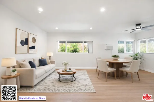a living room with furniture a window and a table