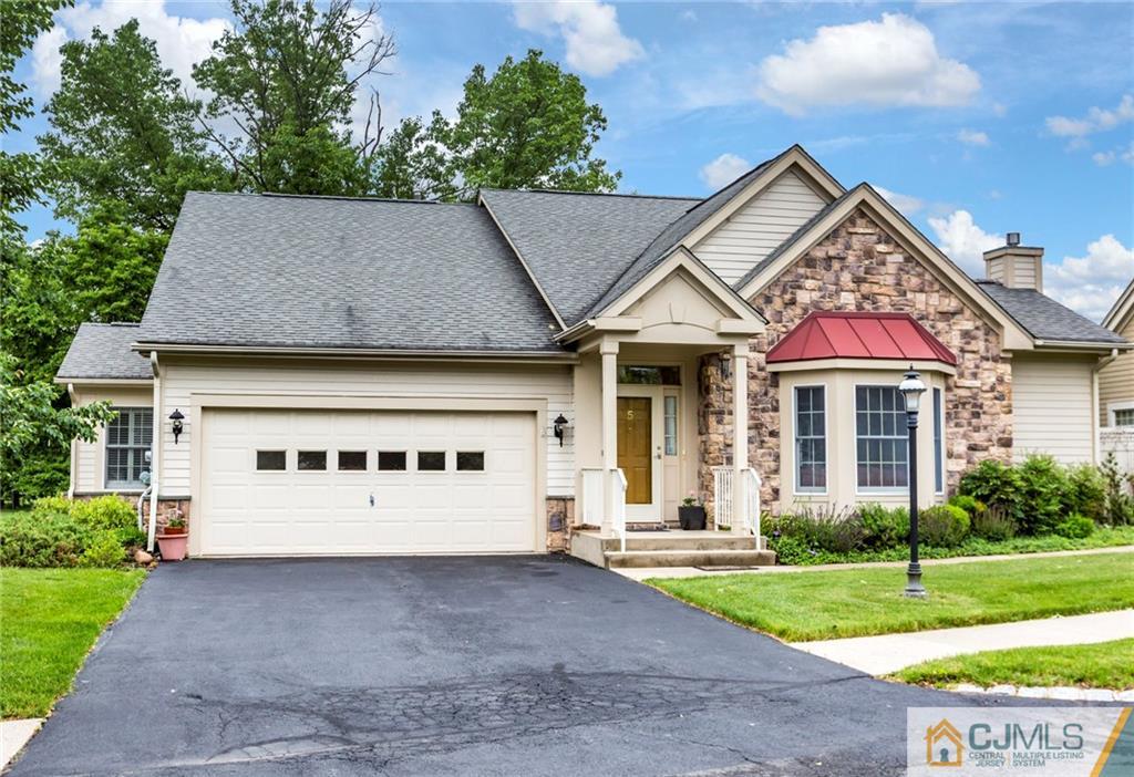 5 Hedge Row Road Plainsboro, NJ 08540 - Photo 1 of 25 a front view of a house with a yard and garage